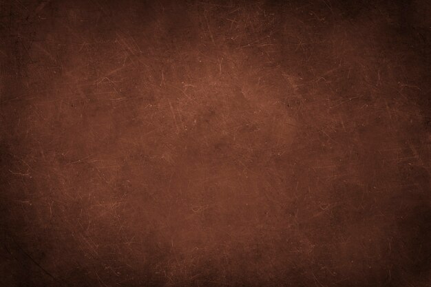 Pared de hormigón marrón con vector de arañazos