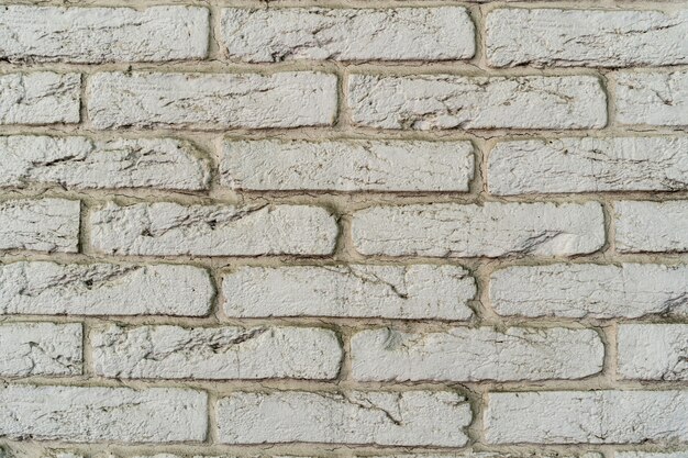 Pared de ladrillo blanco. Textura de ladrillo con relleno blanco