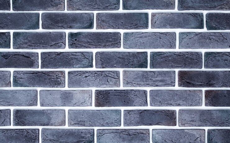 Foto gratuito pared de ladrillo gris claro