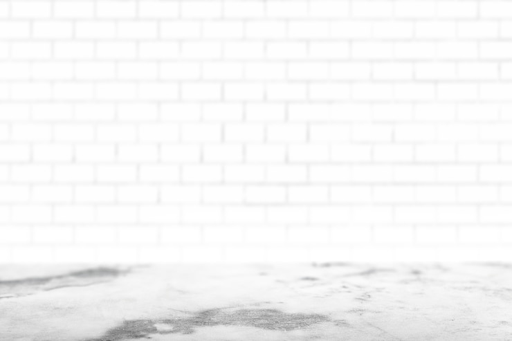 Foto gratuito pared de ladrillo pintada de blanco