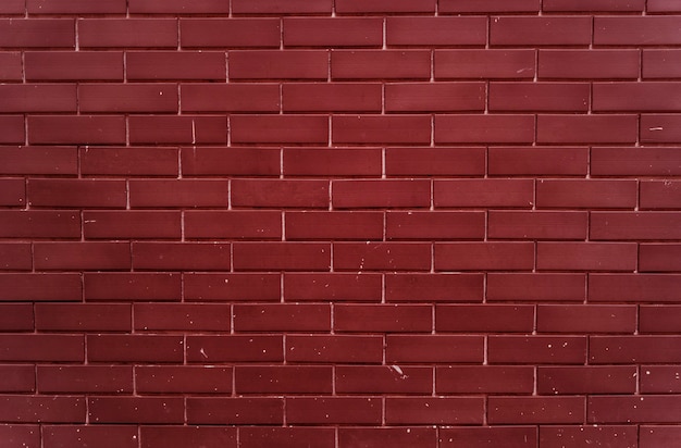 Pared de ladrillo rojo brillante llano