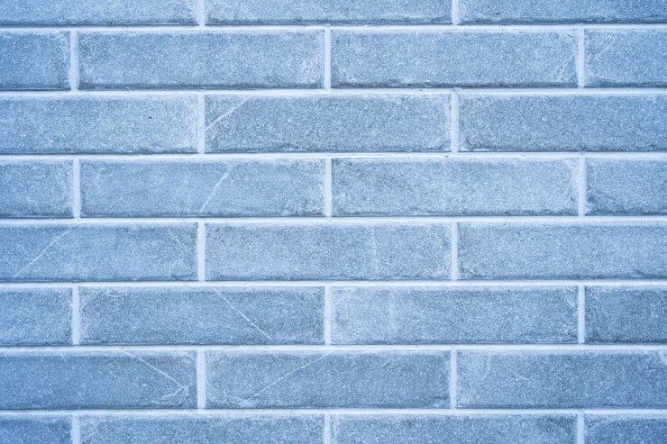 Foto gratuito pared de ladrillo. textura de ladrillo gris con relleno blanco
