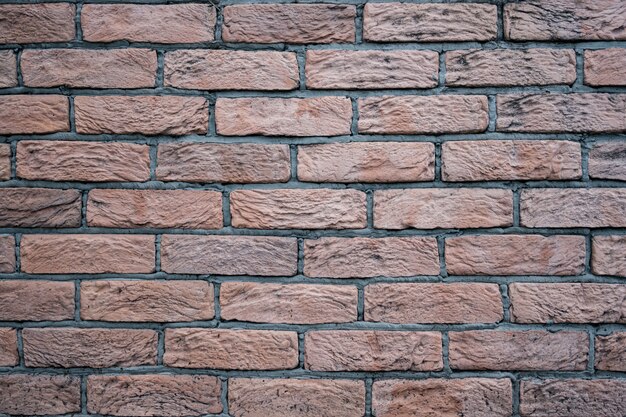 Pared de ladrillo. Textura de ladrillo rojo con relleno gris