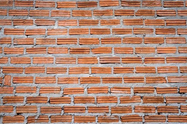 Foto gratuita pared de ladrillos con cemento fresco