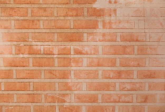 Foto gratuita pared de ladrillos con manchas blancas