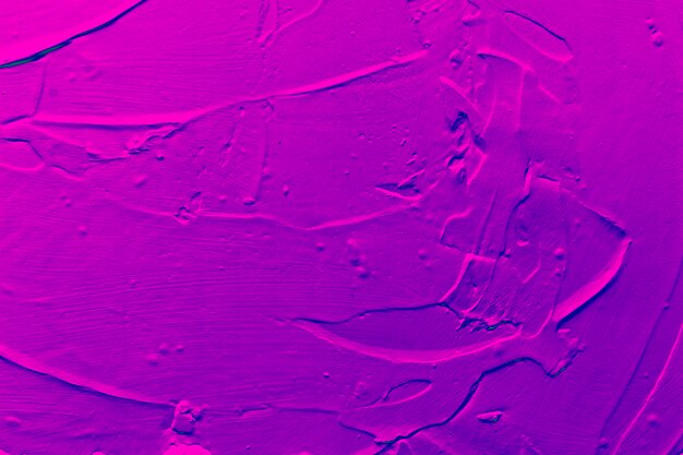 Pared con textura abstracta con pintura púrpura