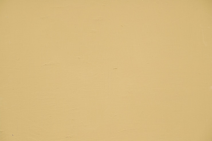 Foto gratuito pared con textura pintada de color beige vacío