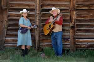 Foto gratuita pareja cantando juntos música country