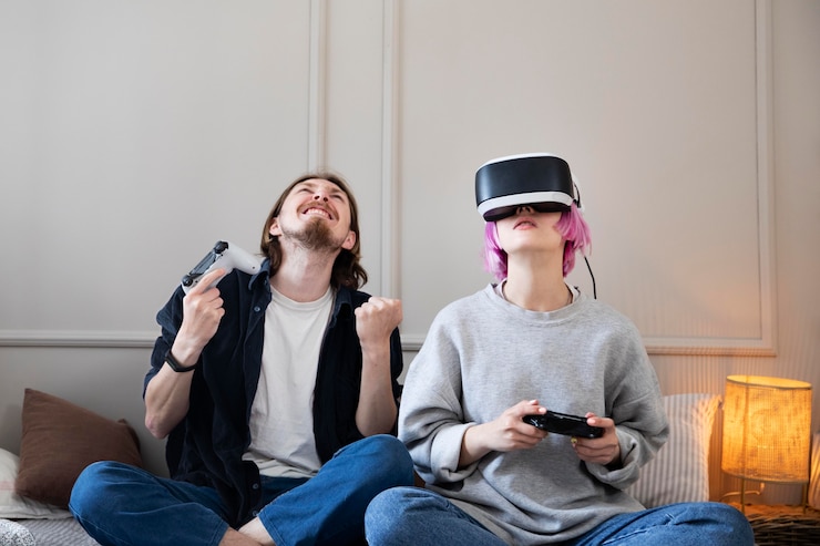 Foto gratuito pareja joven jugando un juego de realidad virtual