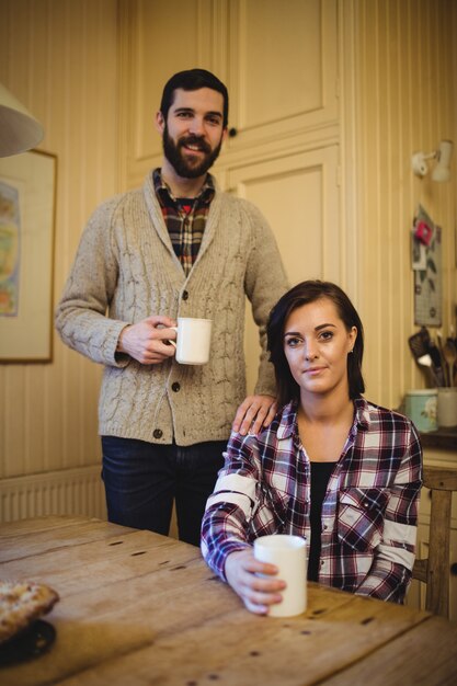 Pareja, tenencia, taza de café