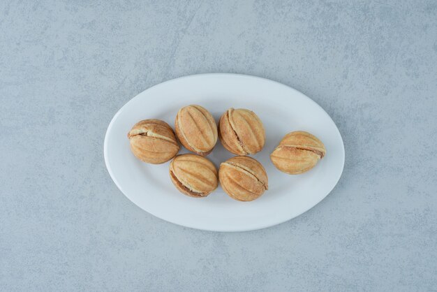 Pastelería dulce sobre fondo de mármol. Foto de alta calidad