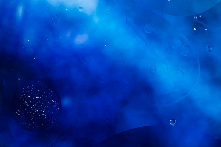 Foto gratuito patrón abstracto de burbujas de aceite coloreadas sobre el agua