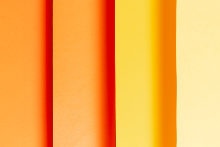 Foto gratuito patrón de colocación plana con tonos de naranja