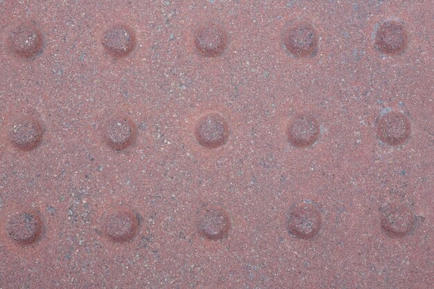 pavimentación roja del fondo del azulejo