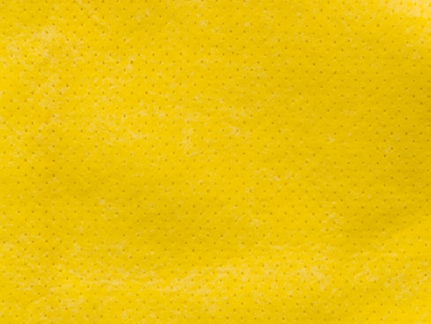 Pequeña tela amarilla punteada textil texturizada