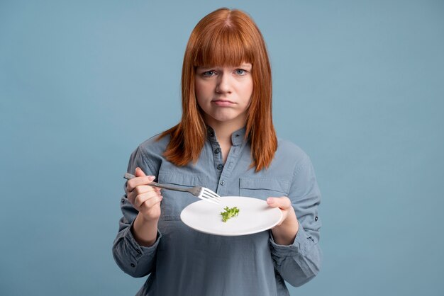 Persona con trastorno alimentario tratando de comer sano.