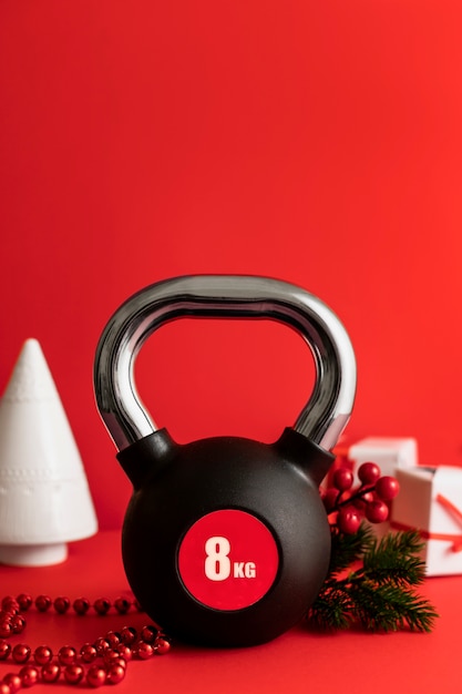 Pesas de fitness navideñas para regalo de entrenamiento.