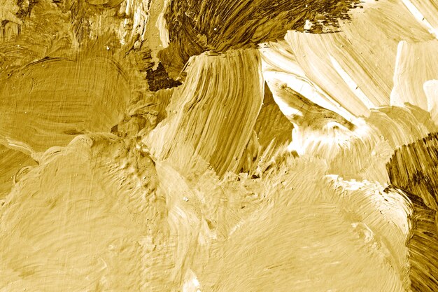 Pincel de pintura de aceite de oro acarició el fondo con textura