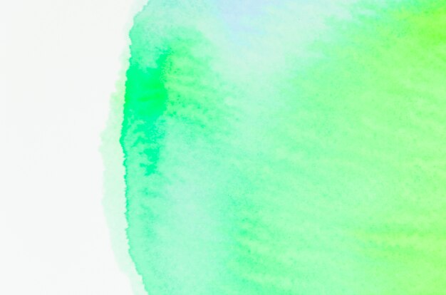 Pintura verde del cepillo de la sombra en el fondo de papel