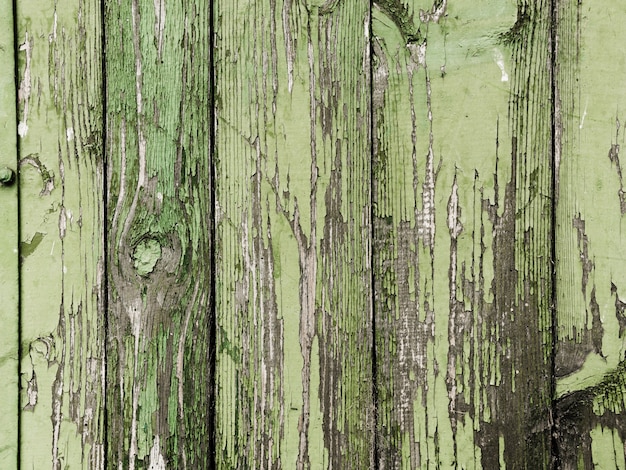Pintura verde pelada de textura de tablón de madera