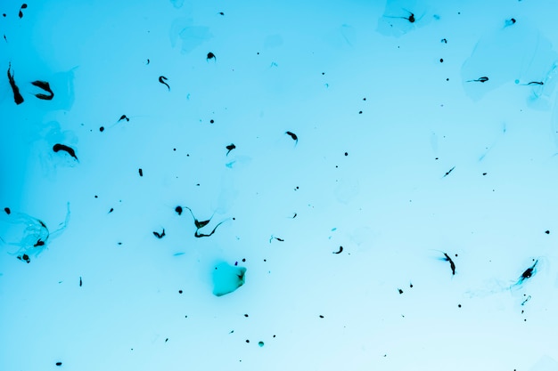 Foto gratuita polvo abstracto de la cámara en el cielo azul llano