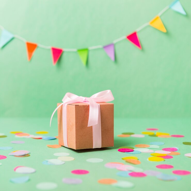 Photo Gratis present with confetti