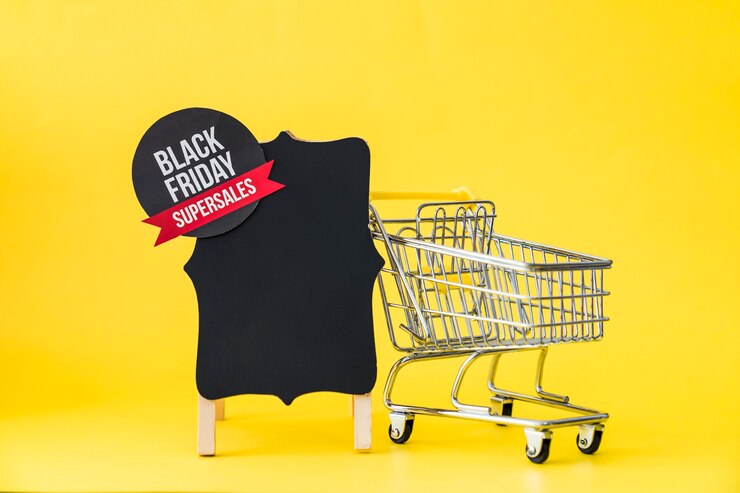 Foto gratuito presentación de black friday con carro