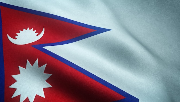 Primer plano de la bandera ondeante de Nepal