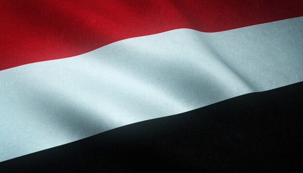 Primer plano de la bandera ondeante de Yemen con texturas interesantes