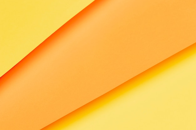 Primer plano de diferentes tonos de papeles naranjas