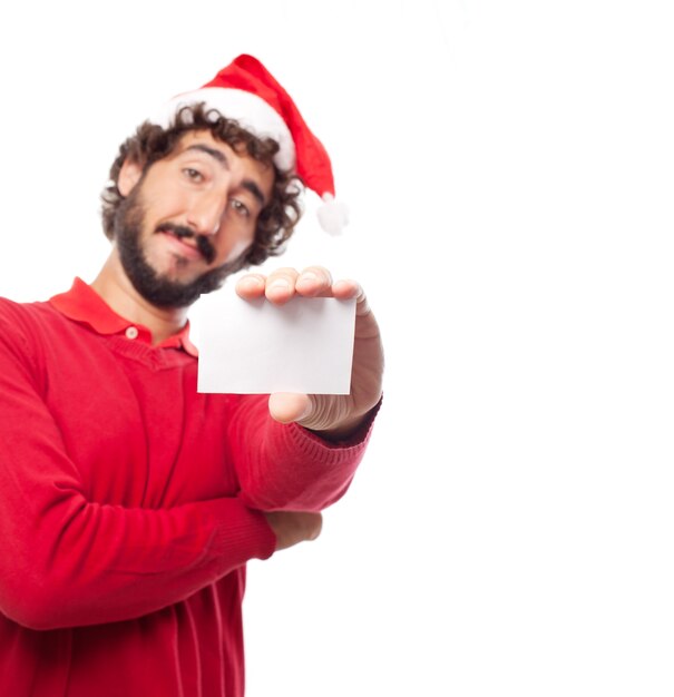 Primer plano de mano sujetando una tarjeta en blanco