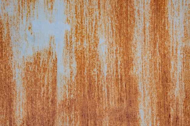 Primer plano de una pared de grunge oxidado