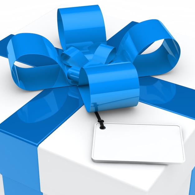 Primer plano de regalo con lazo azul y etiqueta en blanco