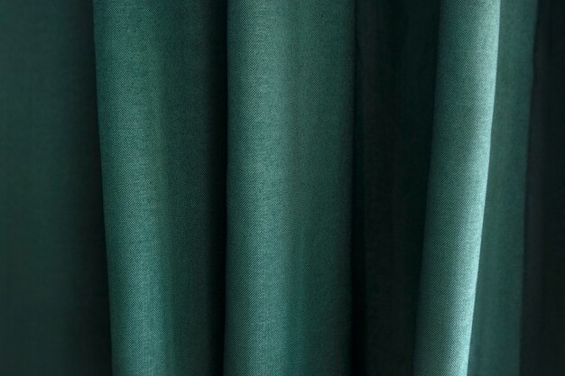 Primer plano de textil verde con pliegues