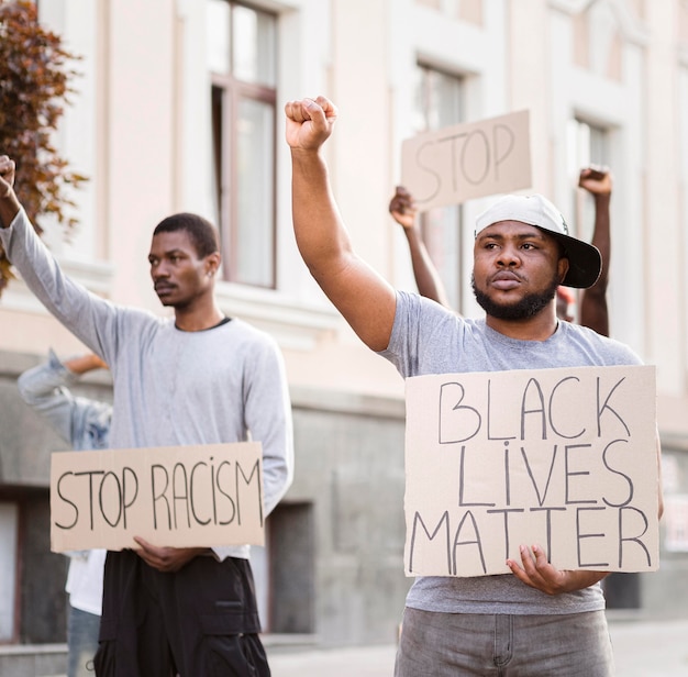 Foto gratuita protesta de materia viva negra