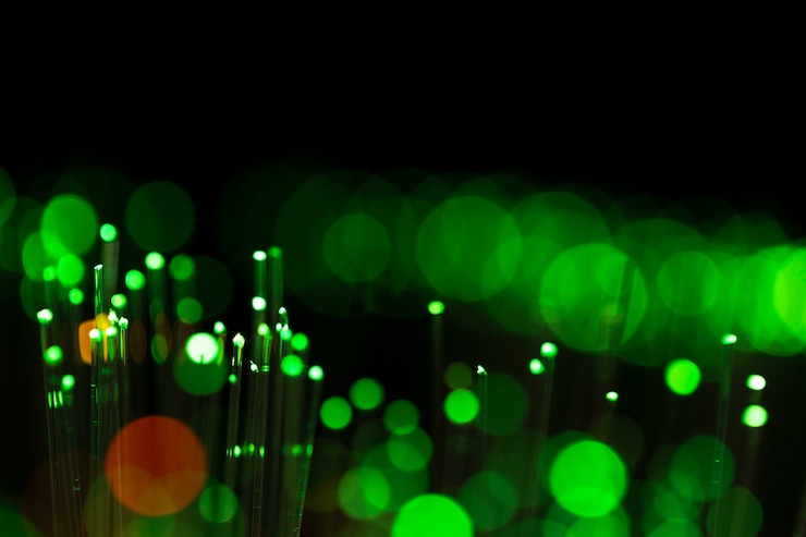 Foto gratuito puntos brillantes borrosos en los tonos verdes