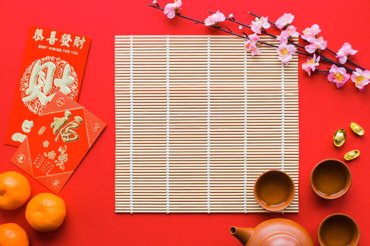 Foto gratuito rama de sakura cerca de cosas de la ceremonia del té