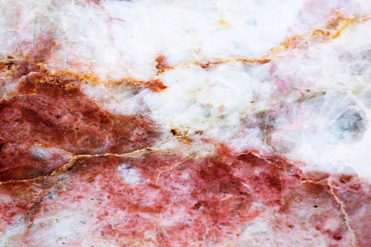 Photo Gratis red cracked marble textured background