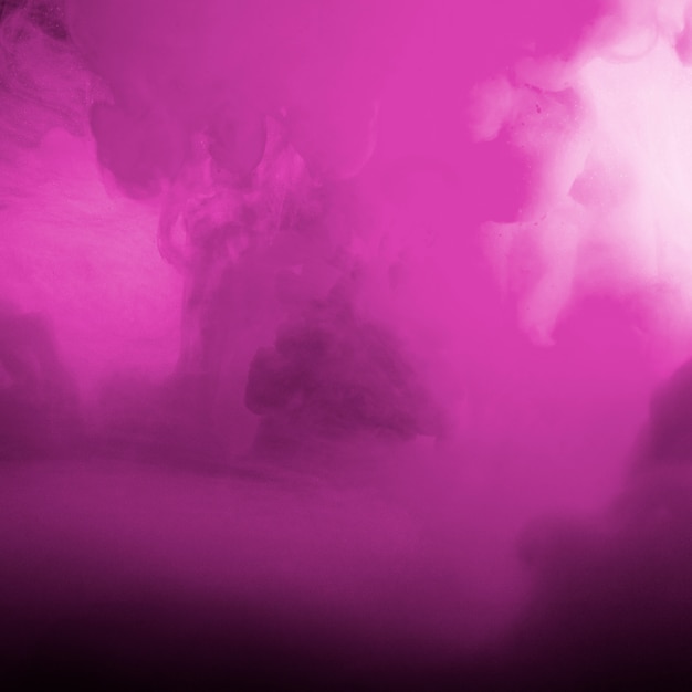 Foto gratuita resumen denso rosa ondeando humo