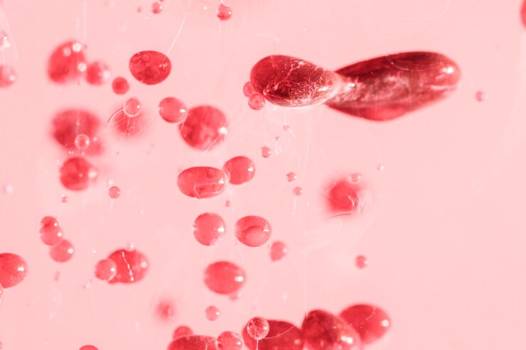Foto gratuito resumen de piedras de aceite en la superficie de color rosa