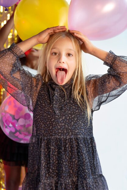 Retrato, niña joven, en, fiesta