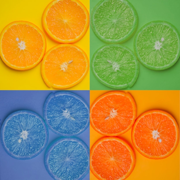 Foto gratuita rodajas de naranja en diferentes colores