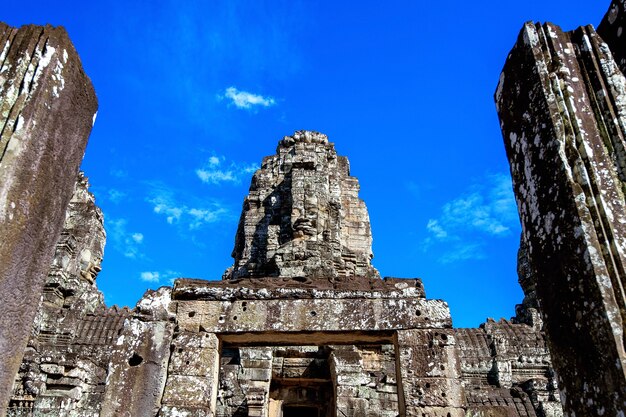 Rostros de piedra antigua del templo de Bayon, Angkor Wat, Siam Reap, Camboya.