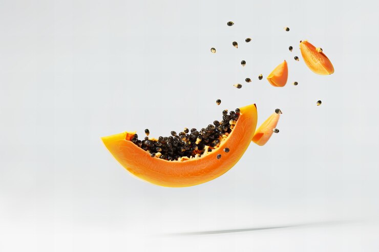 Foto gratuito la sabrosa papaya es una naturaleza muerta.