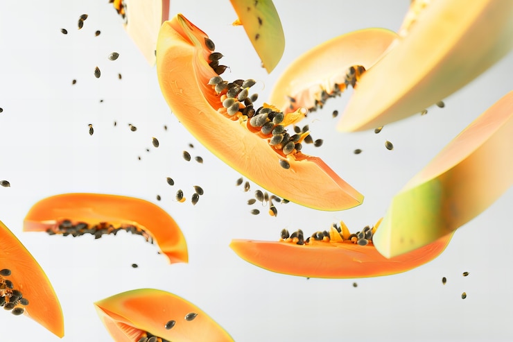 Foto gratuito la sabrosa papaya es una naturaleza muerta.