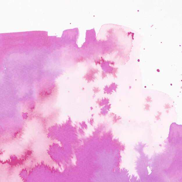 Salpicaduras de acuarela rosa abstracta sobre fondo blanco