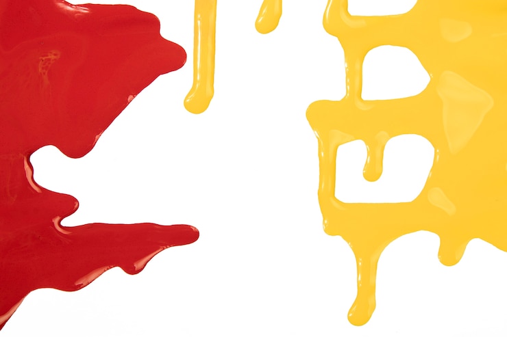 Foto gratuito salpicaduras de pintura roja y amarilla