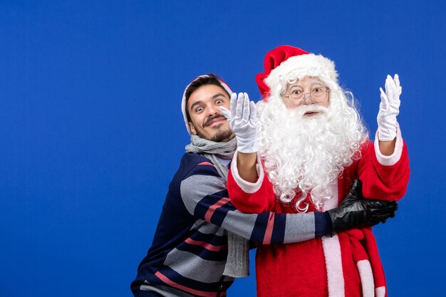 Foto gratuita santa claus, vista frontal, con, macho joven