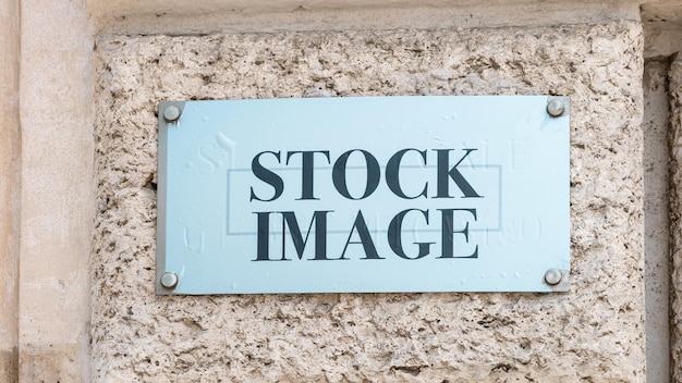 Signo de imagen de stock en una pared.