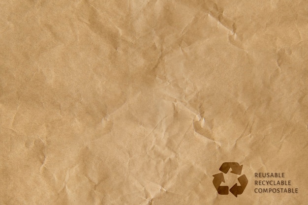 Foto gratuita símbolo de reciclaje marrón campaña compostable reciclable reutilizable de fondo